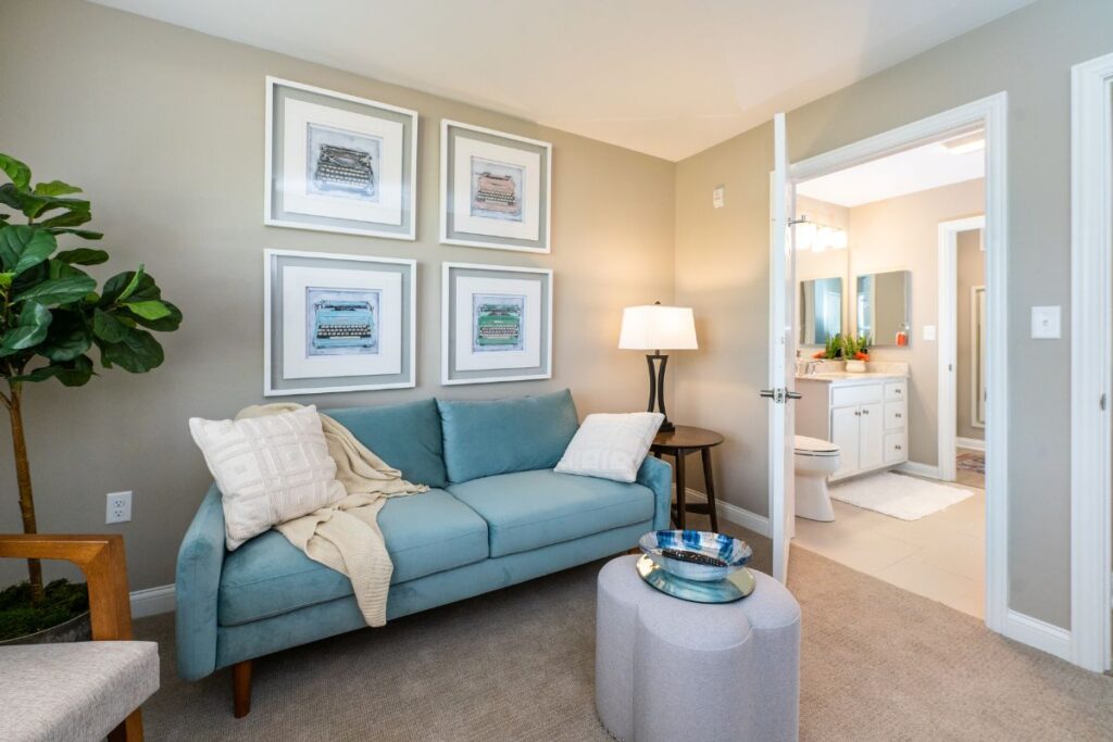 Verena at Hilliard luxury cottage living room teal couch