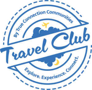Blue and yellow circular logo with a plane, cloud, and moon, reading By True Connection Communities, Travel Club and Explore. Experience. Connect. in stylized text.