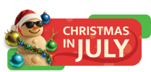 A sand snowman wearing sunglasses and a Santa hat, decorated with seashells and Christmas ornaments, stands next to a red and green CHRISTMAS IN JULY banner highlighting exciting Special Offers.